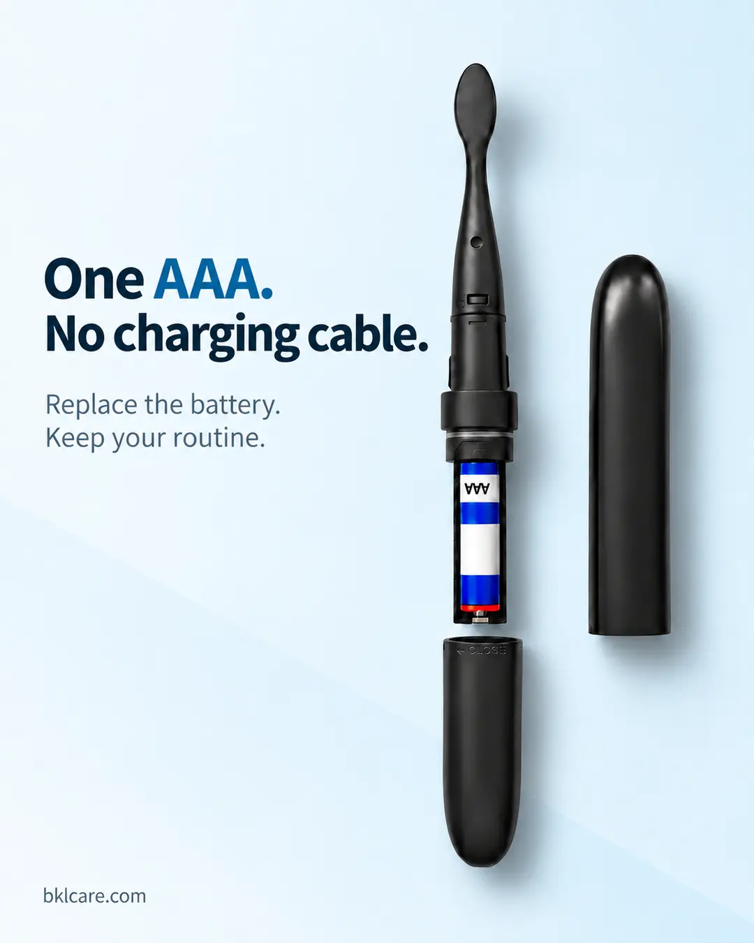 BJ-MA002 toothbrush with its AAA battery compartment exposed and protective cap alongside.